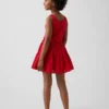 Kinderjurk van gemengde materialen met gelaagde tanktop