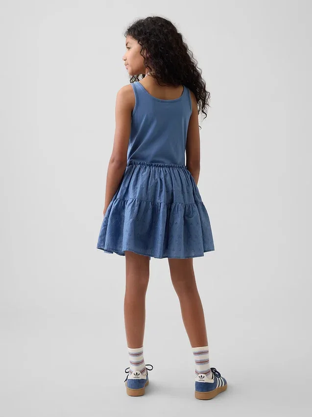 Kinderjurk van gemengde materialen met gelaagde tanktop