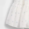 Kinderjurk van gemengde materialen met gelaagde tanktop