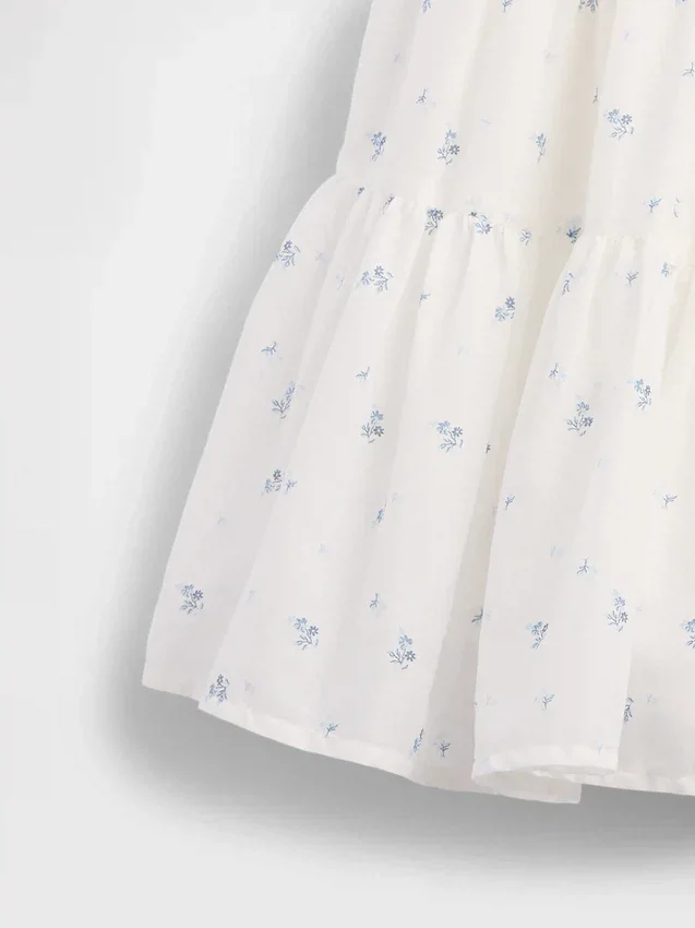 Kinderjurk van gemengde materialen met gelaagde tanktop