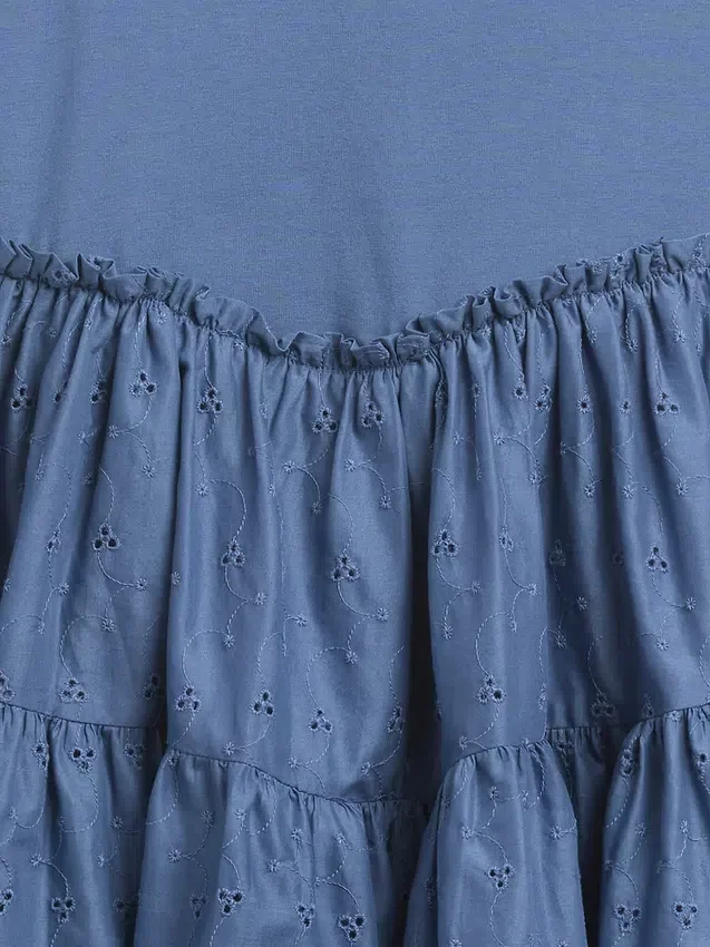 Kinderjurk van gemengde materialen met gelaagde tanktop