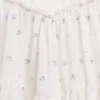 Kinderjurk van gemengde materialen met gelaagde tanktop