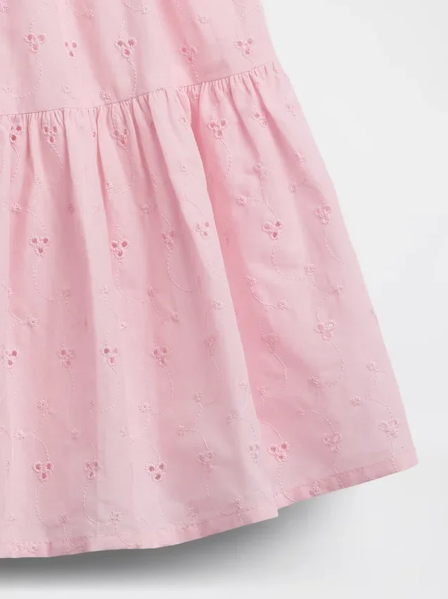 Kinderjurk van gemengde materialen met gelaagde tanktop