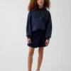 Kinderrokje met omgeslagen tailleband