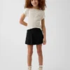 Kinderrokje met omgeslagen tailleband