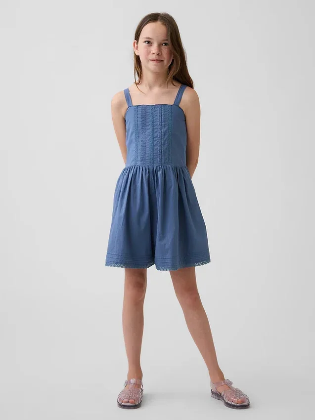 Kinderromper met kanten rand