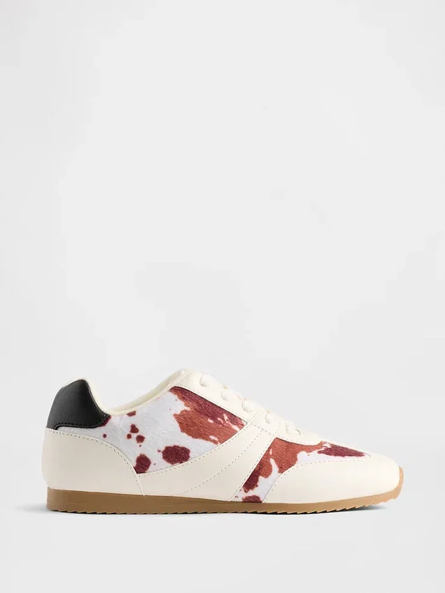 Kindersneakers met koeienprint