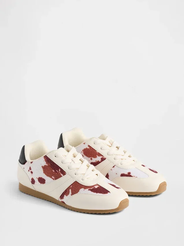 Kindersneakers met koeienprint