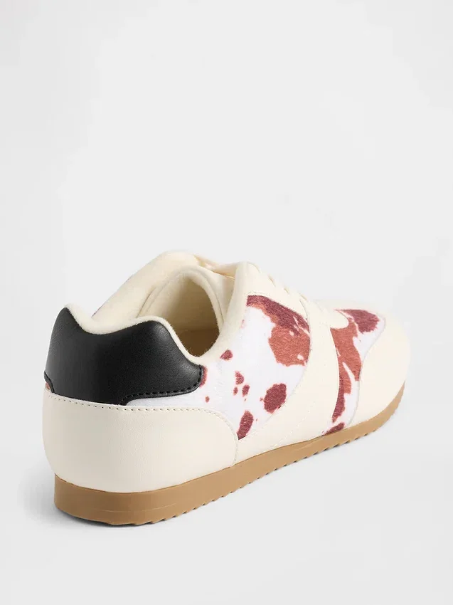 Kindersneakers met koeienprint
