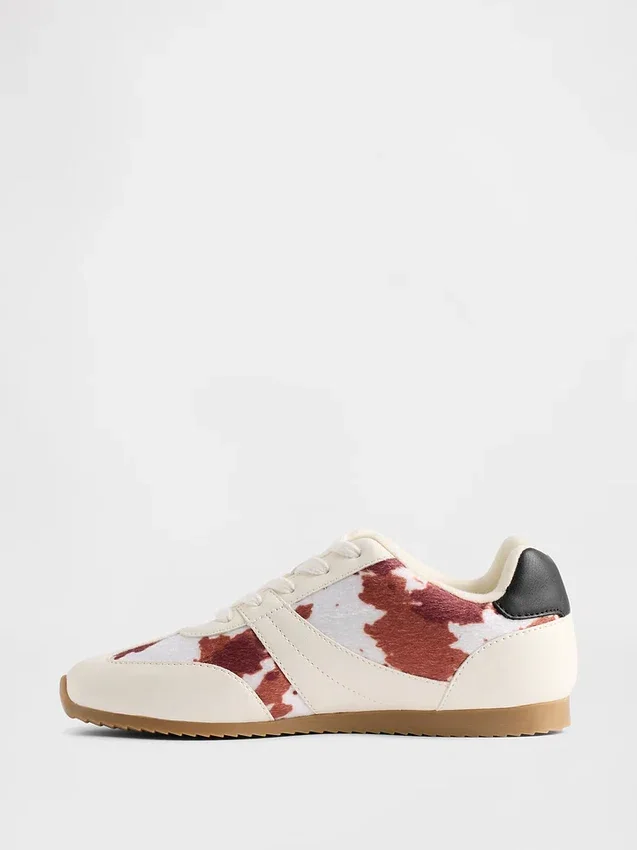 Kindersneakers met koeienprint