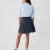 Kinderuniform: geplooide kaki skort