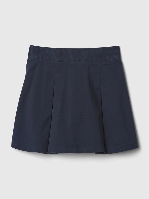 Kinderuniform: geplooide kaki skort
