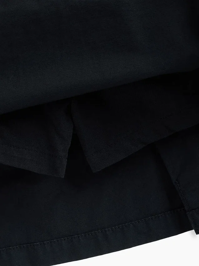 Kinderuniform: geplooide kaki skort
