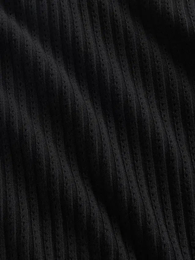 Korte coltrui met pointelle-rib