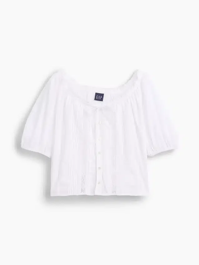 Korte top met plooitjes en ellebooglange mouwen