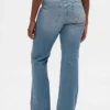Laag uitgesneden, lange en slanke Jeans met vetersluiting