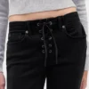 Laag uitgesneden, lange en slanke Jeans met vetersluiting