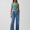 Laag uitgesneden, ultrazachte, loszittende Jeans in jaren '90-stijl met dolfinzoom
