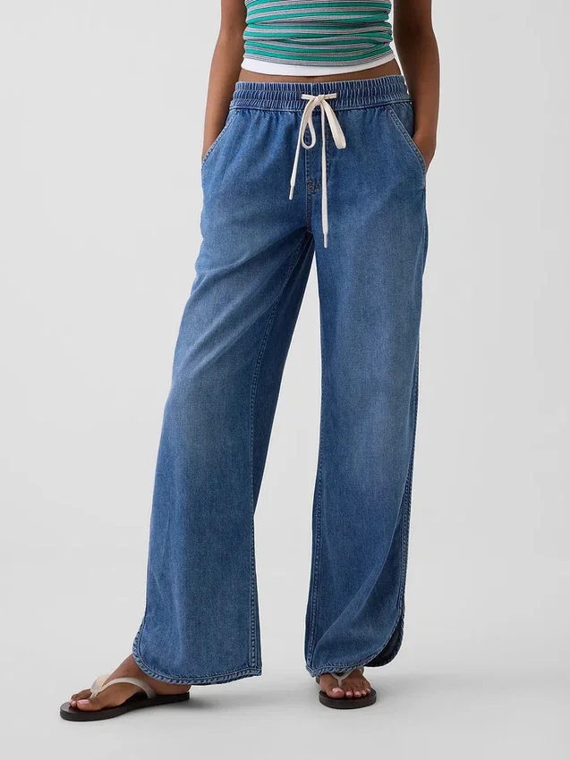 Laag uitgesneden, ultrazachte, loszittende Jeans in jaren '90-stijl met dolfinzoom