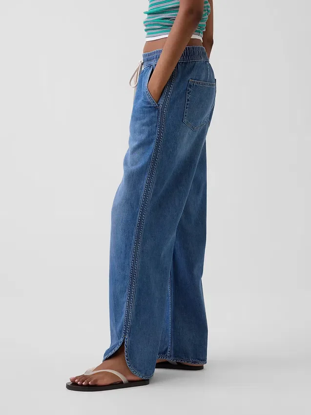 Laag uitgesneden, ultrazachte, loszittende Jeans in jaren '90-stijl met dolfinzoom