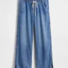 Laag uitgesneden, ultrazachte, loszittende Jeans in jaren '90-stijl met dolfinzoom