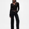 Laaggetailleerde, loszittende Jeans in jaren ’90-stijl
