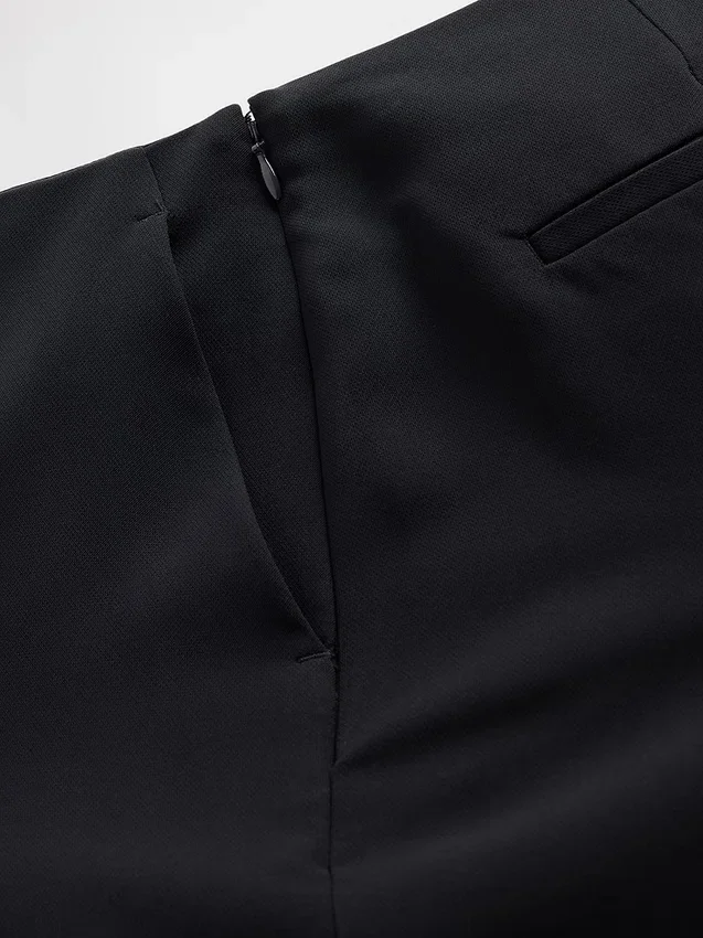 Laaggetailleerde twill-broek met uitlopende pijpen