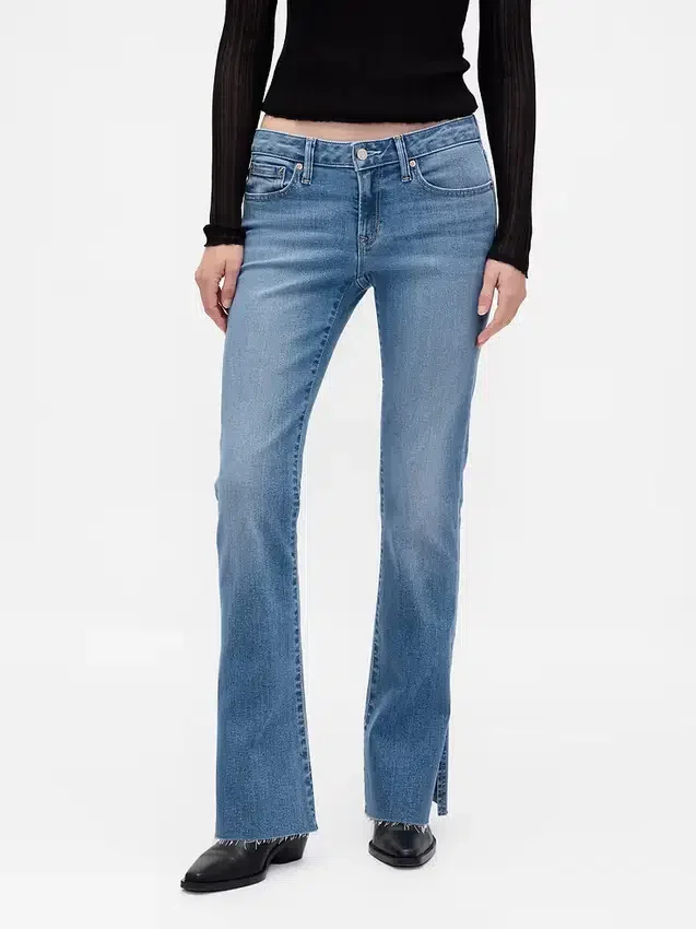 Lage taille, lange en slanke Jeans met gespleten zoom