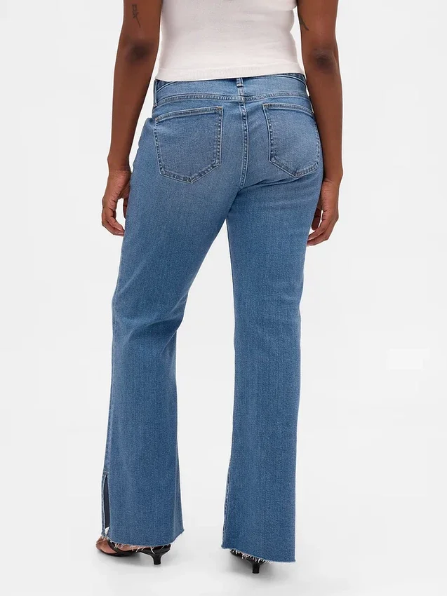 Lage taille, lange en slanke Jeans met gespleten zoom