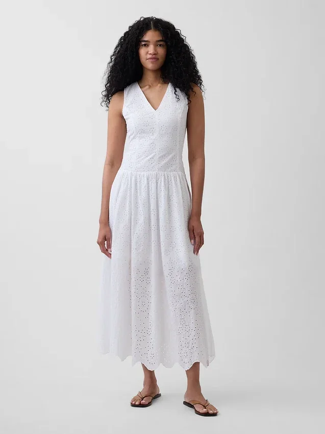 Maxijurk met oogjes en lage taille