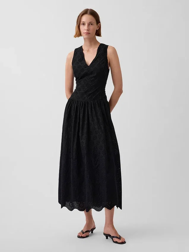 Maxijurk met oogjes en lage taille