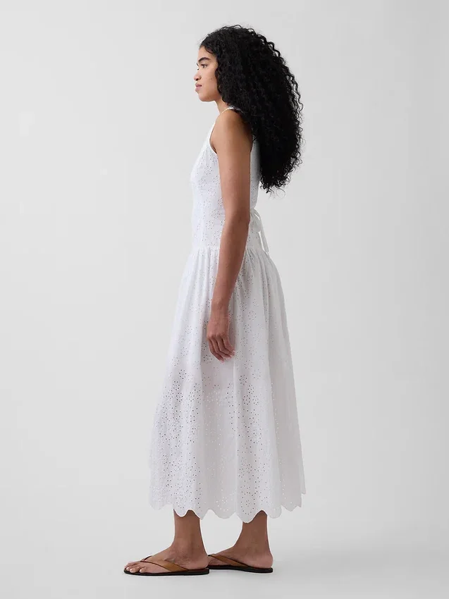 Maxijurk met oogjes en lage taille