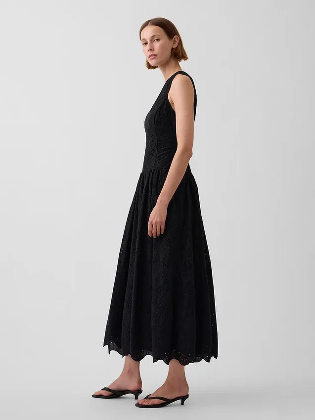 Maxijurk met oogjes en lage taille