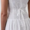 Maxijurk met oogjes en lage taille