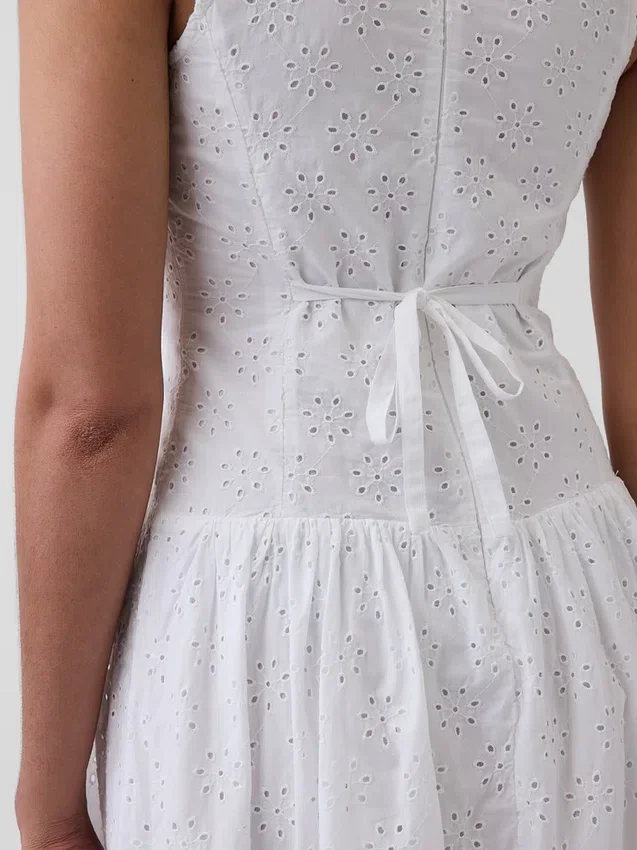 Maxijurk met oogjes en lage taille