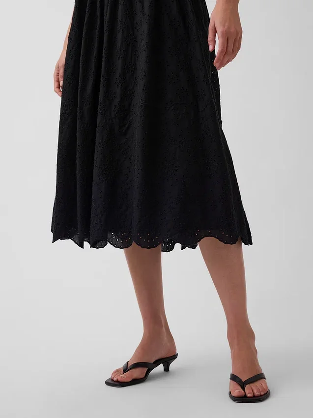 Maxijurk met oogjes en lage taille