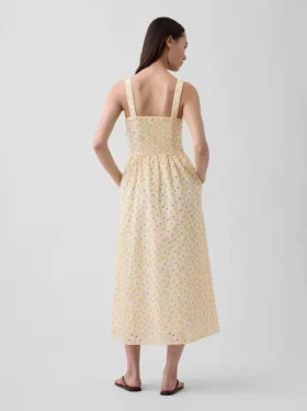 Maxijurk met oogjes, naden en lage taille