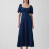 Maxijurk van denim met pofmouwtjes en knoopsluiting aan de voorkant