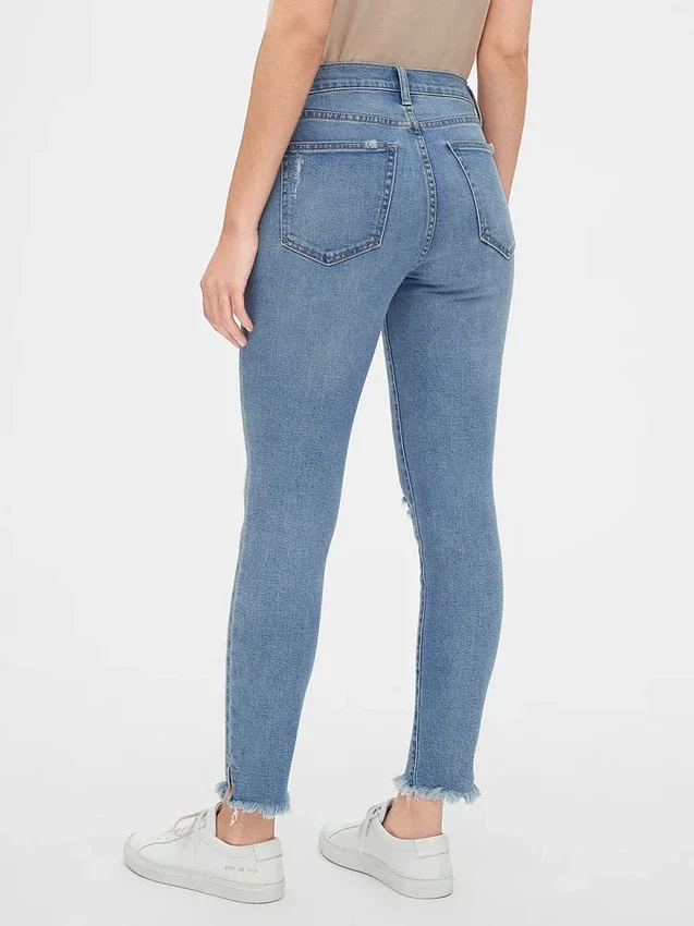 Mid-rise distressed true skinny enkellange Jeans