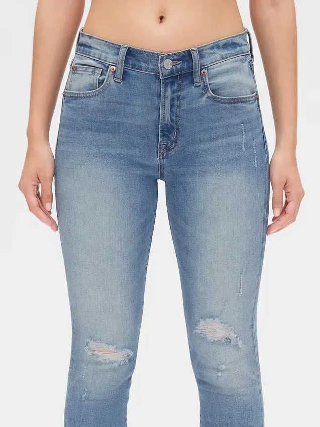 Mid-rise distressed true skinny enkellange Jeans
