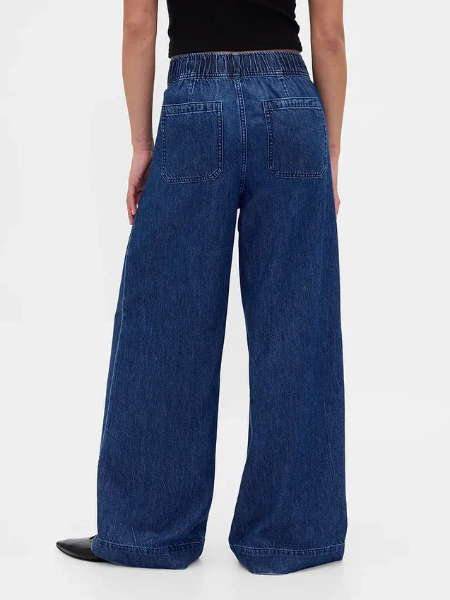 Mid-rise ultrazachte baggy Jeans met plooien