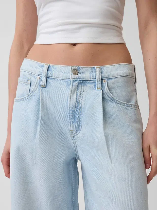 Mid-rise ultrazachte baggy Jeans met plooien