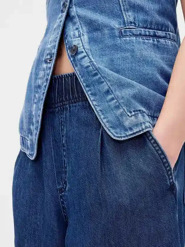 Mid-rise ultrazachte baggy Jeans met plooien