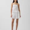 Mini-skort met plooitjes en kanten rand