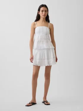 Mini-skort met plooitjes en kanten rand