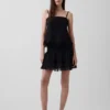 Mini-skort met plooitjes en kanten rand