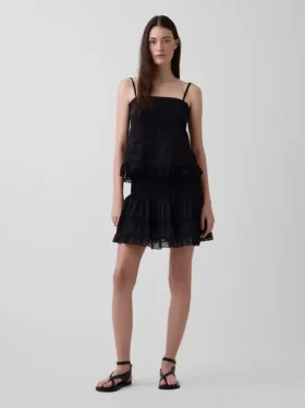 Mini-skort met plooitjes en kanten rand