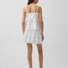 Mini-skort met plooitjes en kanten rand