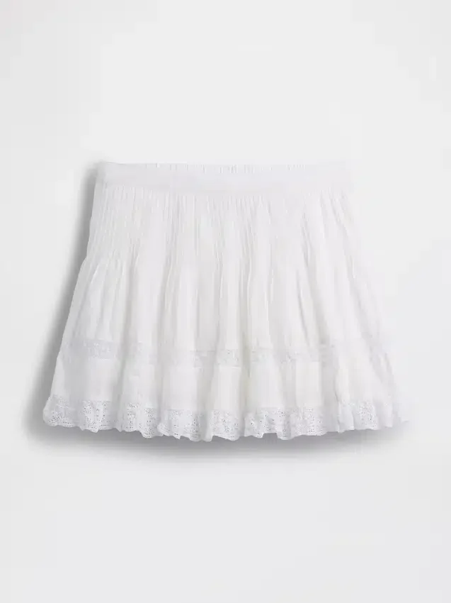 Mini-skort met plooitjes en kanten rand