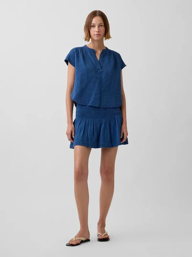 Mini-skort van katoenen gaasdenim met gesmokte taille